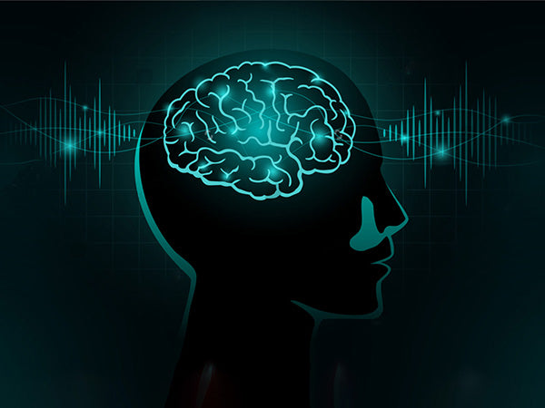 Illustration side view of a head in black with blue hightlights showing the brain & the connections with waves coming out